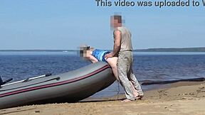 Tourist and boatman in hot scene at the beach