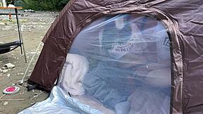 Japanese Brunette Babe Gives Outdoor Blowjob in Tent at Camp