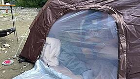 Japanese Brunette Babe Gives Outdoor Blowjob in Tent at Camp