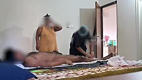 Two women give a massage with a hot scene of flashing and jerking off