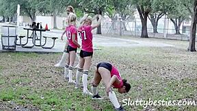 All the girls of the football team are having fun with the balls