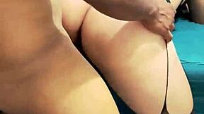 Beautiful brunette gets hot and steamy with lingerie-wearing husband