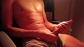 Muscular guy jerks off with intense moans and cum