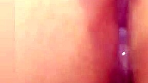 A small white girl with piercings has an orgasm in this video