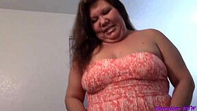 Asian house wife undressing and showing her big belly