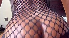 Beautiful black woman shows off her big ass and oiled up body in a solo performance