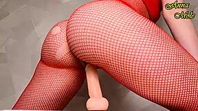 Hot milf in red fishnets enjoys a solo pleasure session