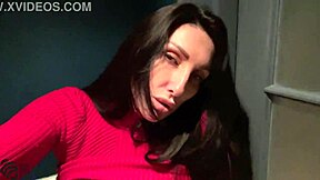 A slut in a nightclub solo pleases herself in the bathroom