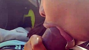 Ebony beauty gets head in parking lot by big cock loving guy