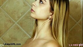 Beautiful teenage blonde gets a shower scene and an interview for a photoshoot