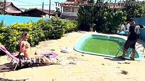 Hot wife gives a complete pool cleaner a handjob outdoors
