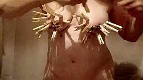 Housewife's kinky self-pleasure with clamps and dirty talk