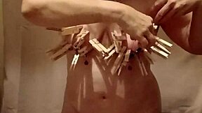 Housewife's kinky self-pleasure with clamps and dirty talk