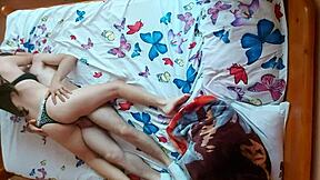A beautiful couple in their teenage years having sex from the top view