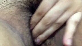 Pretty Asian woman masturbates after work and achieves orgasm with female ejaculation