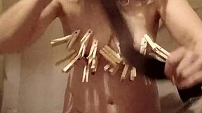 Housewife's kinky self-pleasure with clamps and dirty talk