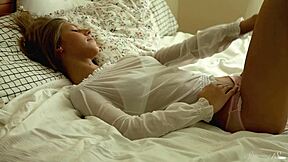 Anjelica is a hot blonde and she shows off her slim body and hairless pussy in this video