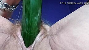 Grandma enjoys hairy pussy and anal sex with cucumber