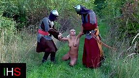 A girl is having a fantastic threesome with two guys outdoors
