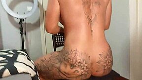 A woman is penetrated in her pussy by two cocks at once