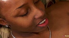 A beautiful lesbian couple holds an intimate kissing moment