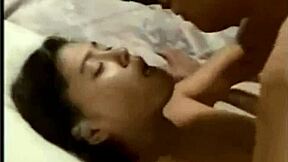 vintage clip shows young asian girl swallowing spit from ugly old japanese man, disturbing yet raw