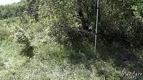Brunette Teen Gives Risky Blowjob in Forest During Camping Trip with Friends