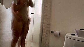 two lesbians share a steamy shower with intense touches
