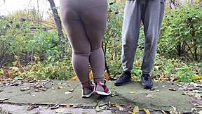 Damn! This curvy milf in leggings squats and pisses right beside me!