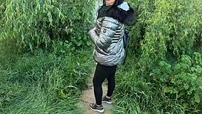 a slutty housewife gets cum all over her shiny jacket outside