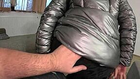 a slutty housewife gets cum all over her shiny jacket outside