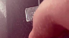 Stepsis unleashes fierce masturbation in a sunny shower with raw intensity.