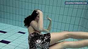 Flashing Bright Tits Underwater Gets Everyone Horny at the Beach. Who Can Resist This Russian Teen?