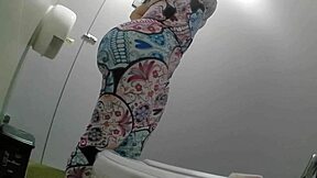 Caught a curvy Latina woman in a tight dress flashing her huge ass in a public bathroom stall. Her moves in that small space were unreal.