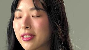 Perfect ass Korean teen Elle Lee fingers herself hard.