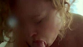 Submissive curly haired slut giving me a sloppy cock suck