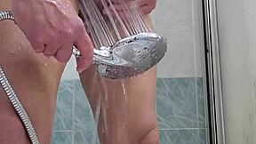 Shower Head Pleasure Hits Hard in Steamy Bath!
