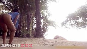 Black Girl Teasing on the Beach with Slow Moves