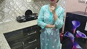 desi indian stepmom with big boobs guides stepson in kitchen sex lesson.