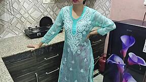 desi indian stepmom with big boobs guides stepson in kitchen sex lesson.