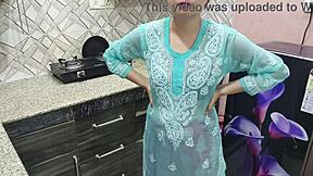 desi indian stepmom with big boobs guides stepson in kitchen sex lesson.