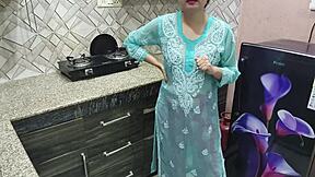 desi indian stepmom with big boobs guides stepson in kitchen sex lesson.